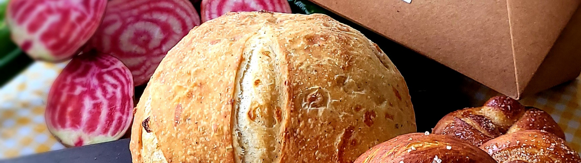 Fresh baked bread and pretzels and veggies