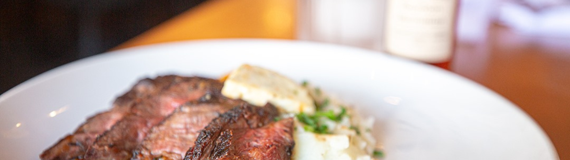 Seared restaurant gourmet steak and mashed potatoes.